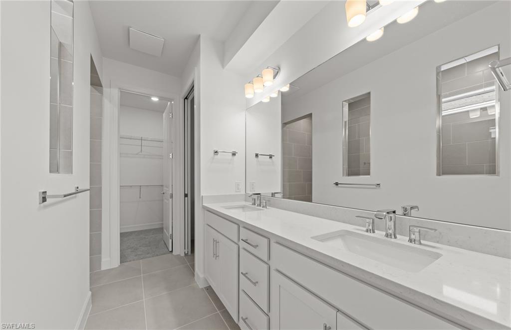 12404 Basalt Lane Alva, FL 33920 - Photo 32 of 50 a bathroom with a sink and a mirror