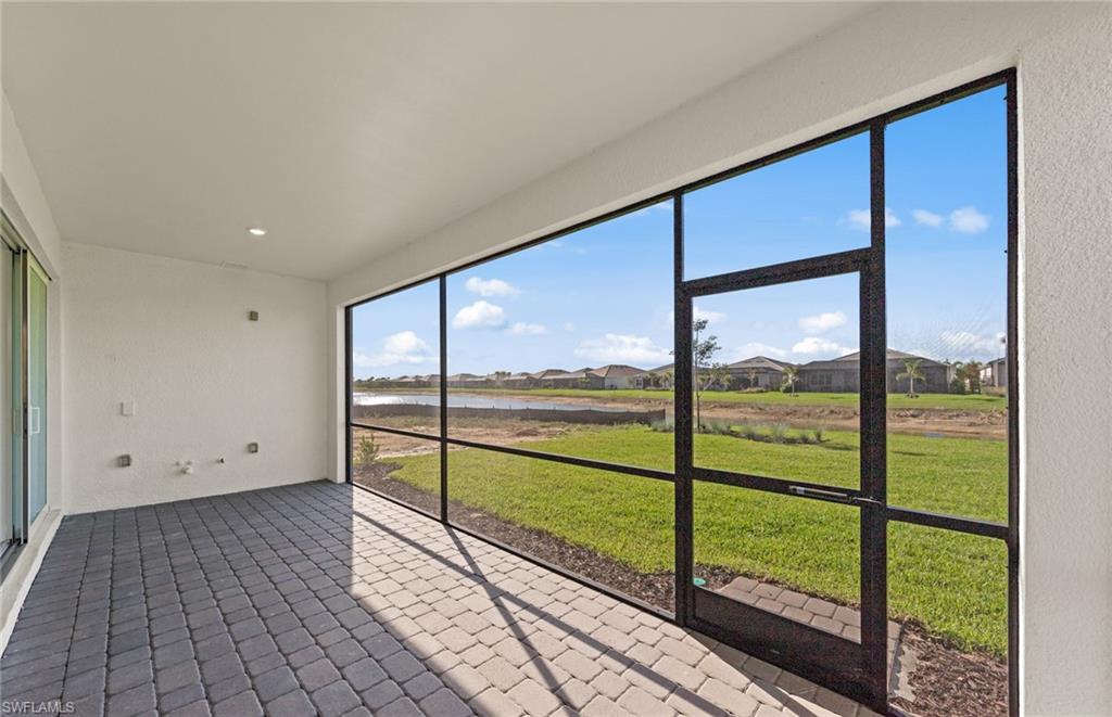 12404 Basalt Lane Alva, FL 33920 - Photo 36 of 50 a view of an empty room with large windows