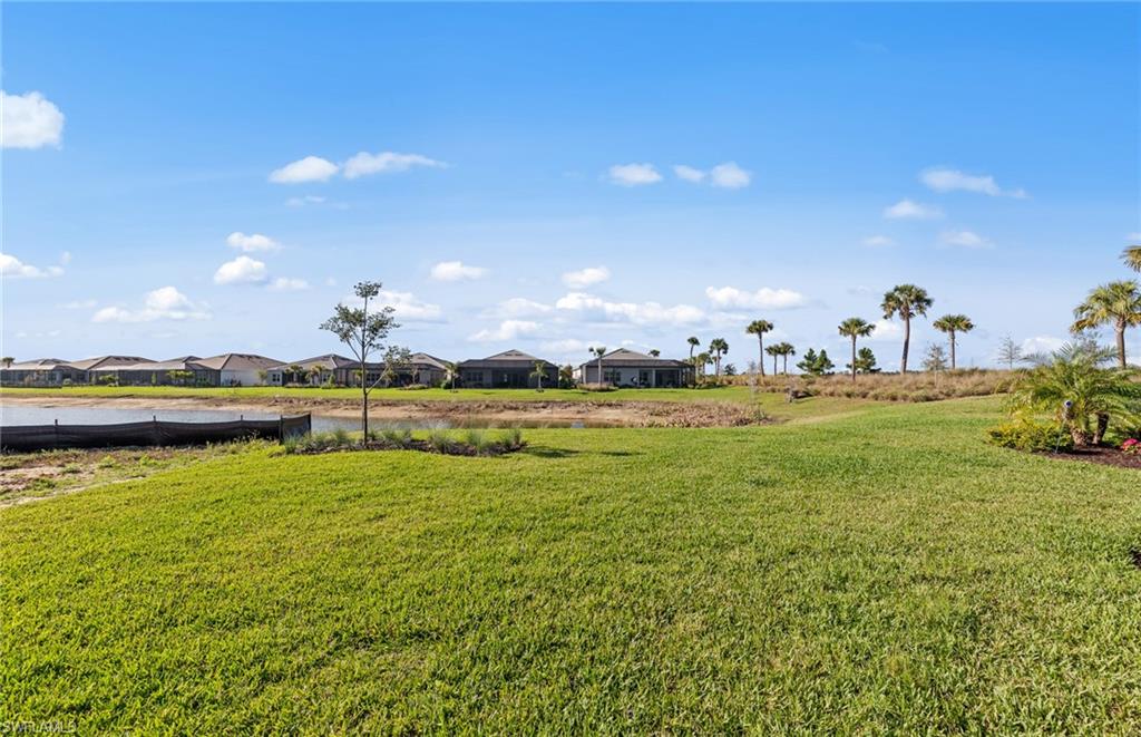 12404 Basalt Lane Alva, FL 33920 - Photo 39 of 50 a view of a lake with outdoor