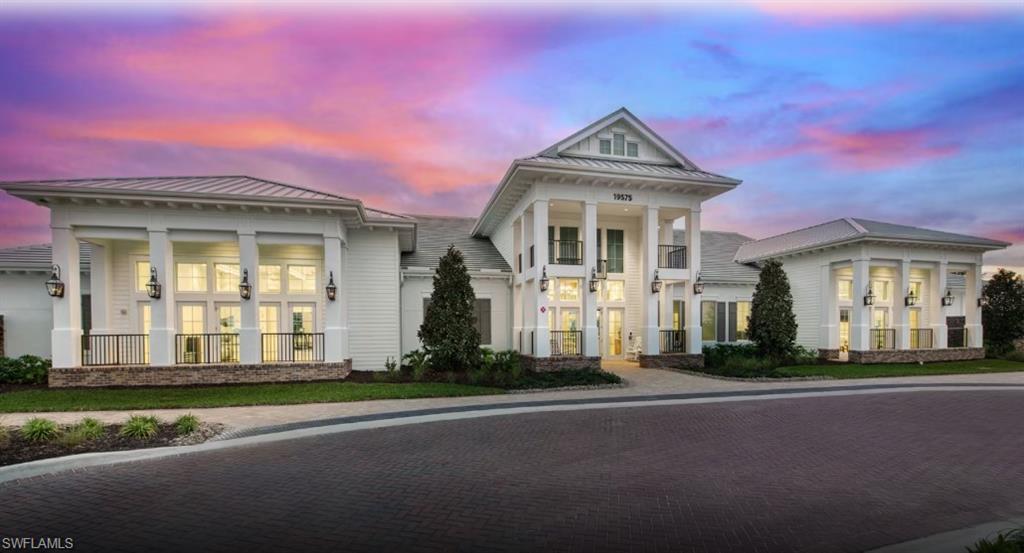 12404 Basalt Lane Alva, FL 33920 - Photo 40 of 50 a front view of a house with a garden