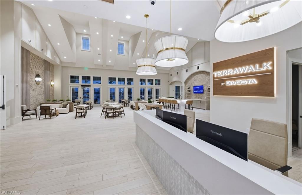 12404 Basalt Lane Alva, FL 33920 - Photo 42 of 50 a large kitchen with a large counter space and stainless steel appliances