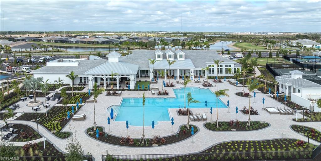 12404 Basalt Lane Alva, FL 33920 - Photo 43 of 50 a view of a city with lawn chairs