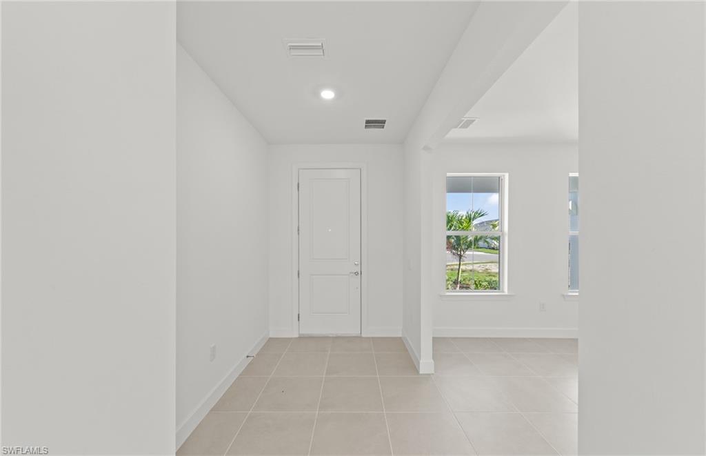 12404 Basalt Lane Alva, FL 33920 - Photo 8 of 50 an empty room with windows and closet