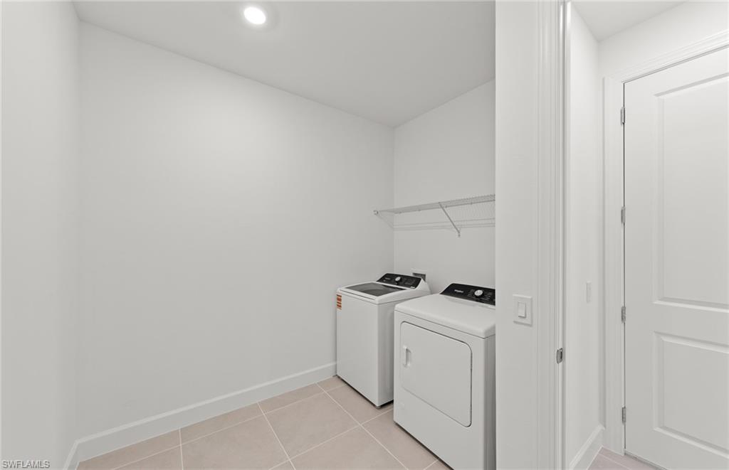 12404 Basalt Lane Alva, FL 33920 - Photo 9 of 50 a utility room with dryer and washer