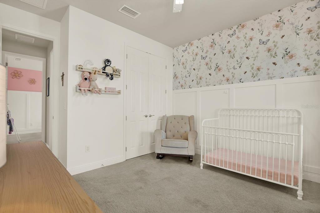 6003 Milestone Drive Apollo Beach, FL 33572 - Photo 27 of 50 a view of a room with baby bed