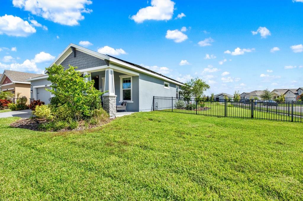 6003 Milestone Drive Apollo Beach, FL 33572 - Photo 31 of 50 a house view with a garden space