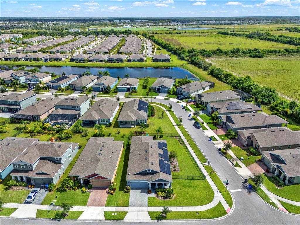 6003 Milestone Drive Apollo Beach, FL 33572 - Photo 32 of 50 an aerial view of a city with lawn chairs