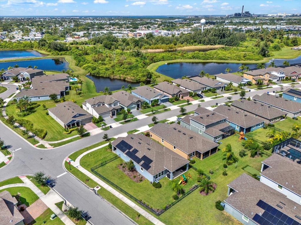 6003 Milestone Drive Apollo Beach, FL 33572 - Photo 33 of 50 an aerial view of a house with a swimming pool yard and outdoor seating