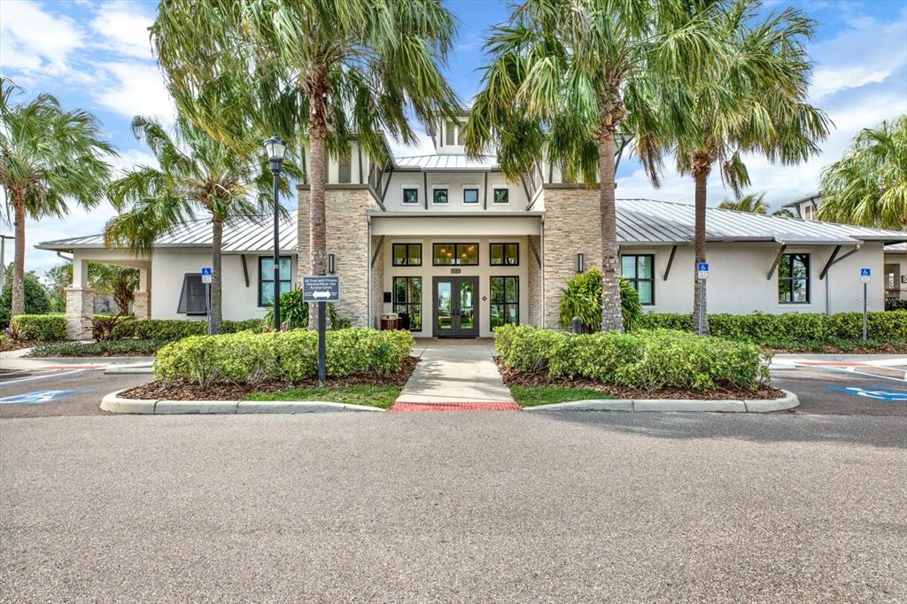 6003 Milestone Drive Apollo Beach, FL 33572 - Photo 35 of 50 front view of a house with a garden
