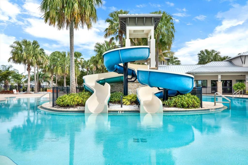 6003 Milestone Drive Apollo Beach, FL 33572 - Photo 39 of 50 a front view of a house with swimming pool having outdoor seating