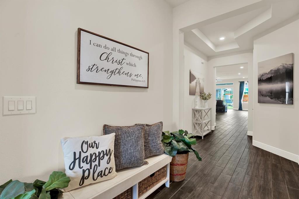 6003 Milestone Drive Apollo Beach, FL 33572 - Photo 6 of 50 a living room with furniture and wooden floor