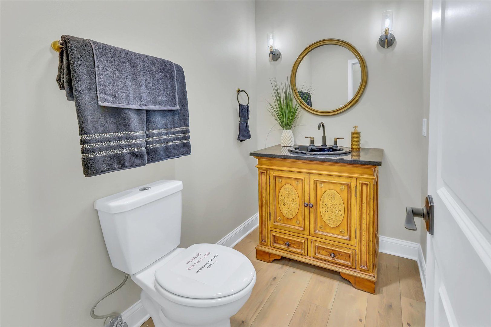 967 West Bauer Road Naperville, IL 60563 - Photo 19 of 37 a bathroom with a toilet a sink and a mirror