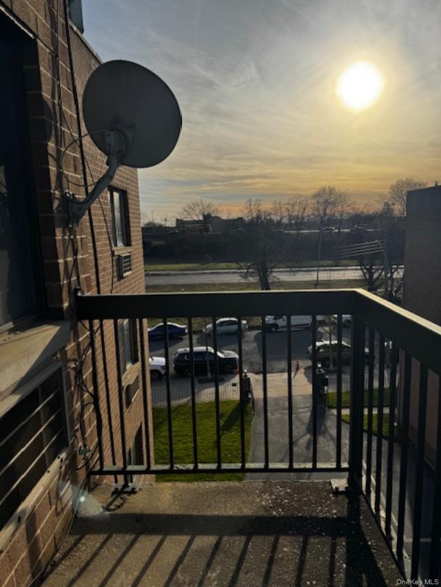 150-40 Tahoe Street, Unit 3C Queens, NY 11417 - Photo 17 of 18 View of balcony at dusk