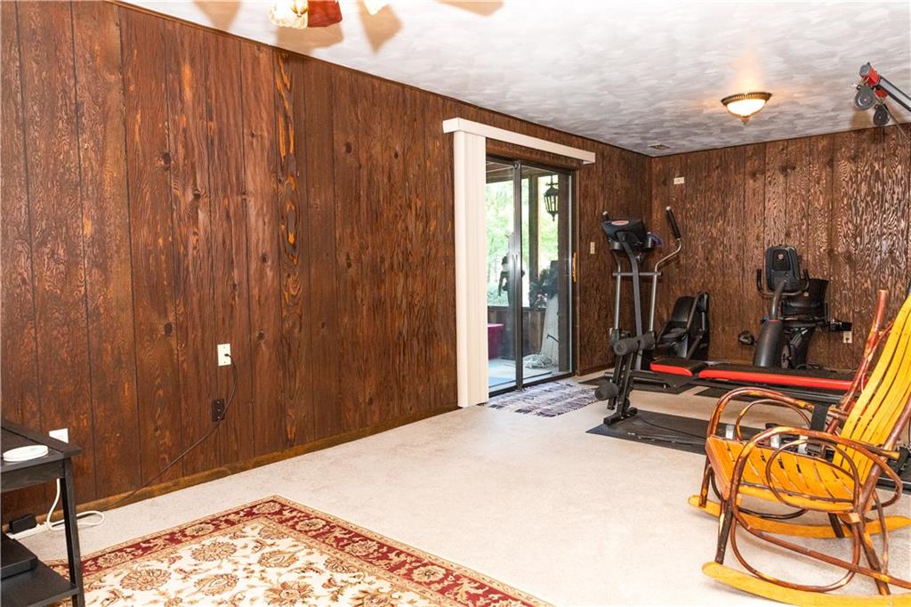 11322 McKee Road North Huntingdon, PA 15642 - Photo 17 of 25 Gameroom leads to a screened porch.