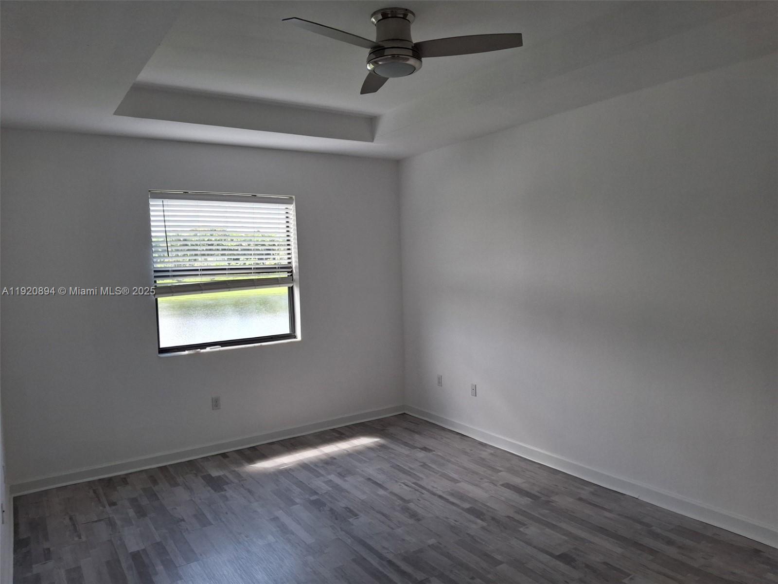 5896 Mustang Manor Davie, FL 33314 - Photo 12 of 14 an empty room with a window