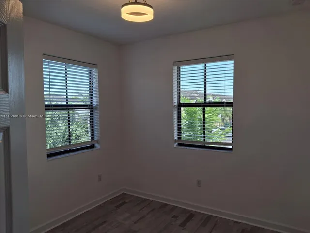 a view of a room that has a window