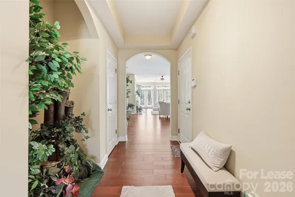 view of living room with furniture and flowers