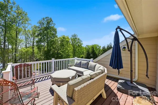 a view of a two chairs in the deck