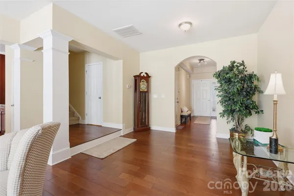 a view of a living room and dining room