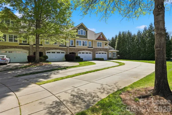 a view of house with yard