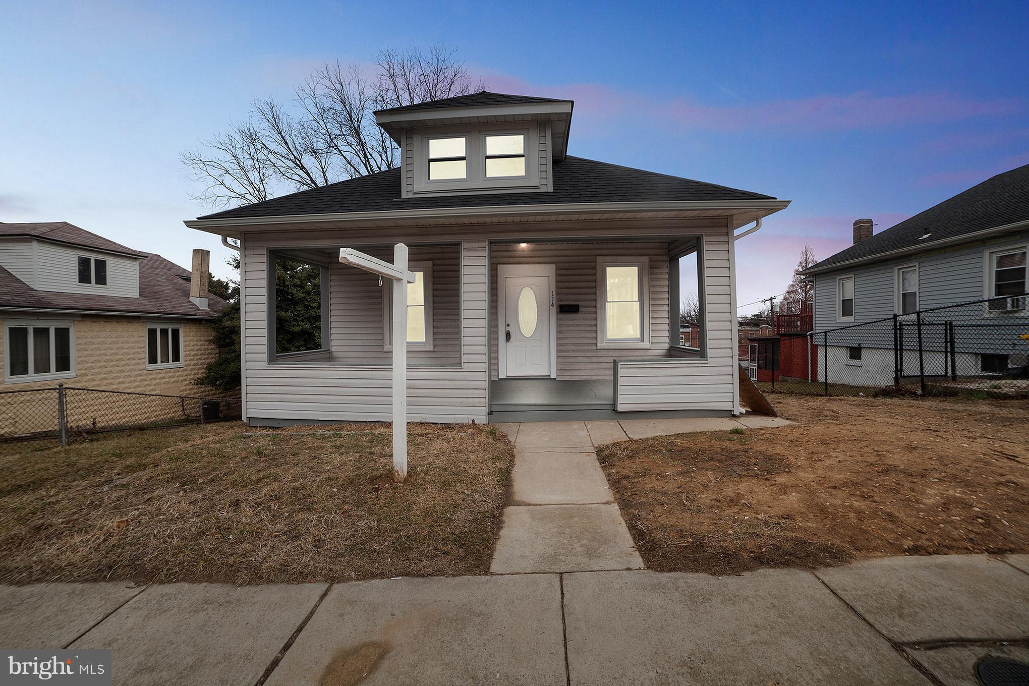 114 West Edgevale Road Baltimore, MD 21225 - Photo 1 of 22 a view of a house with a parking space