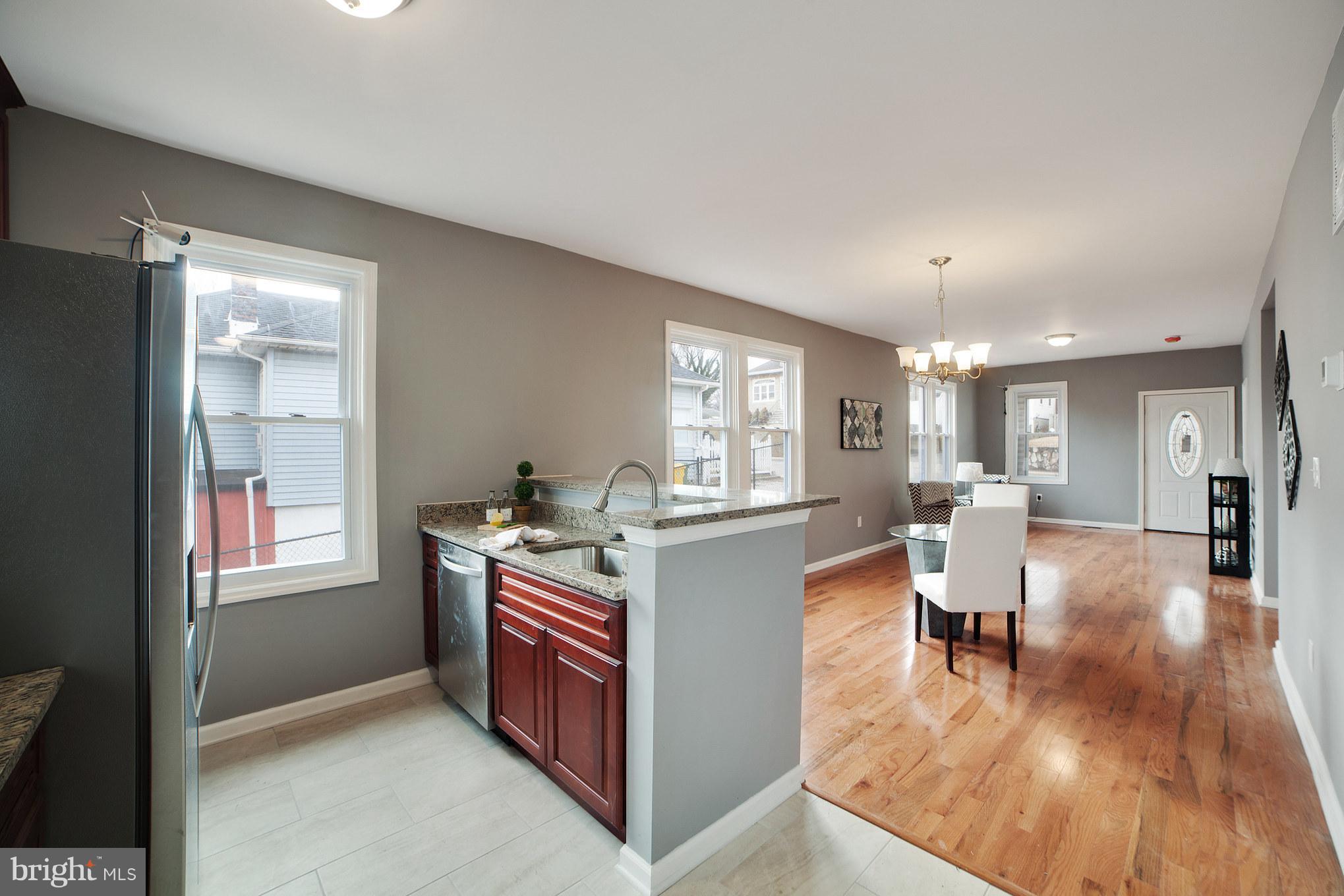 114 West Edgevale Road Baltimore, MD 21225 - Photo 22 of 22 a view of a kitchen and dining room