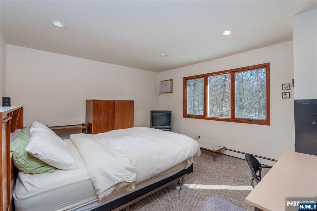 12 Ledgewood Terrace Butler, NJ 07405 - Photo 13 of 34 a bedroom with a bed and window