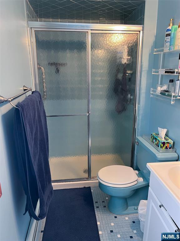 12 Ledgewood Terrace Butler, NJ 07405 - Photo 16 of 34 a bathroom with a toilet and a shower