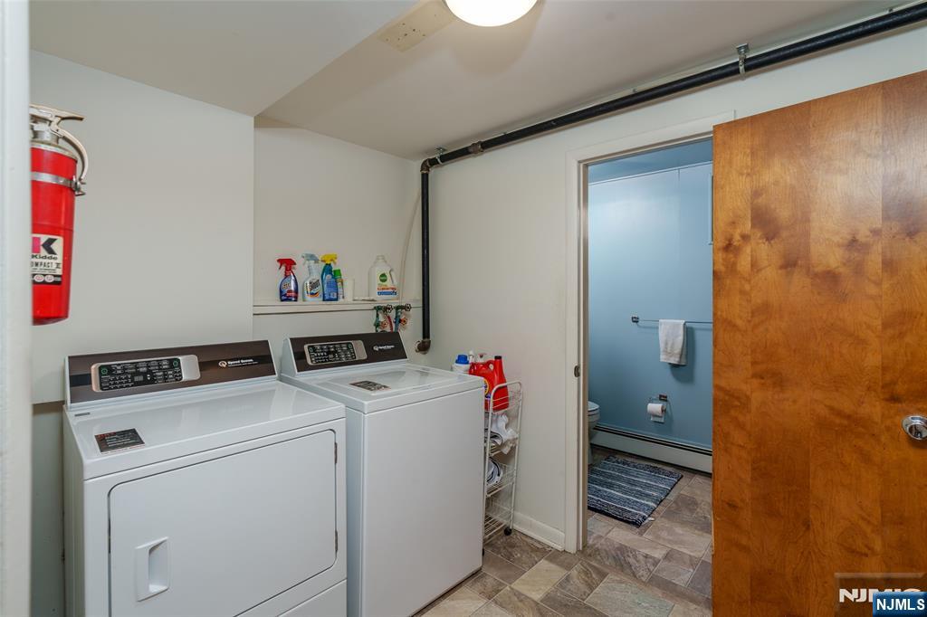 12 Ledgewood Terrace Butler, NJ 07405 - Photo 19 of 34 a view of storage and utility room with washer and dryer