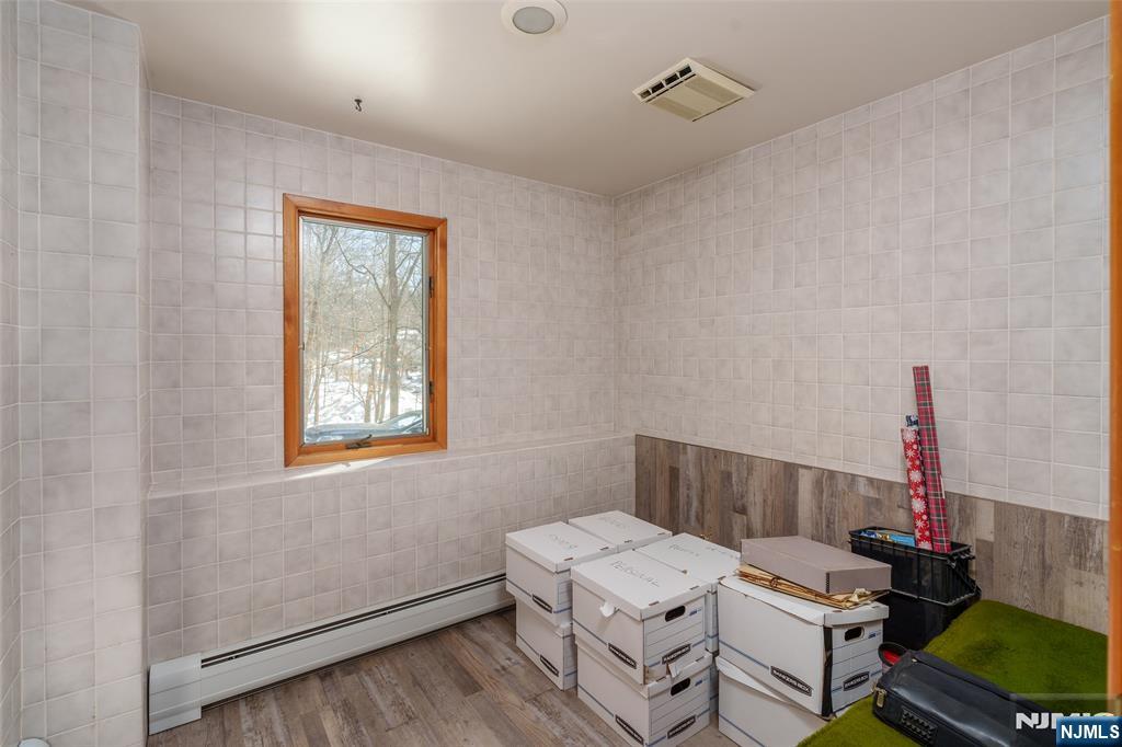 12 Ledgewood Terrace Butler, NJ 07405 - Photo 23 of 34 a room with furniture and a window