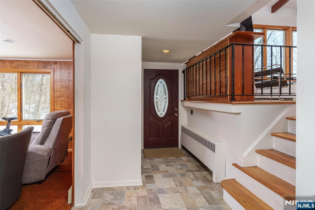 12 Ledgewood Terrace Butler, NJ 07405 - Photo 4 of 34 a view of living room kitchen with furniture and windows