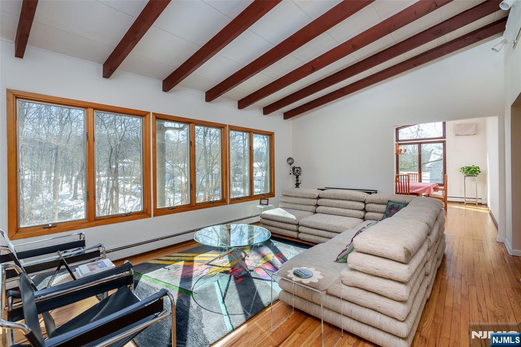 12 Ledgewood Terrace Butler, NJ 07405 - Photo 5 of 34 a living room with furniture and a large window