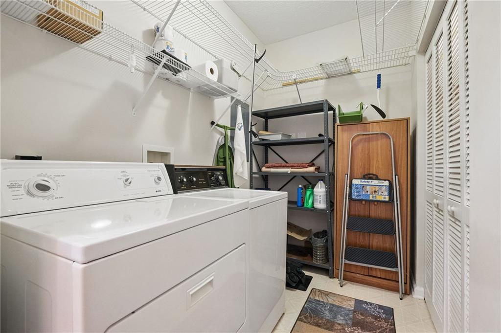 850 Hidden Ridge Court, Unit 101 South Park, PA 15129 - Photo 28 of 38 a utility room with dryer and washer