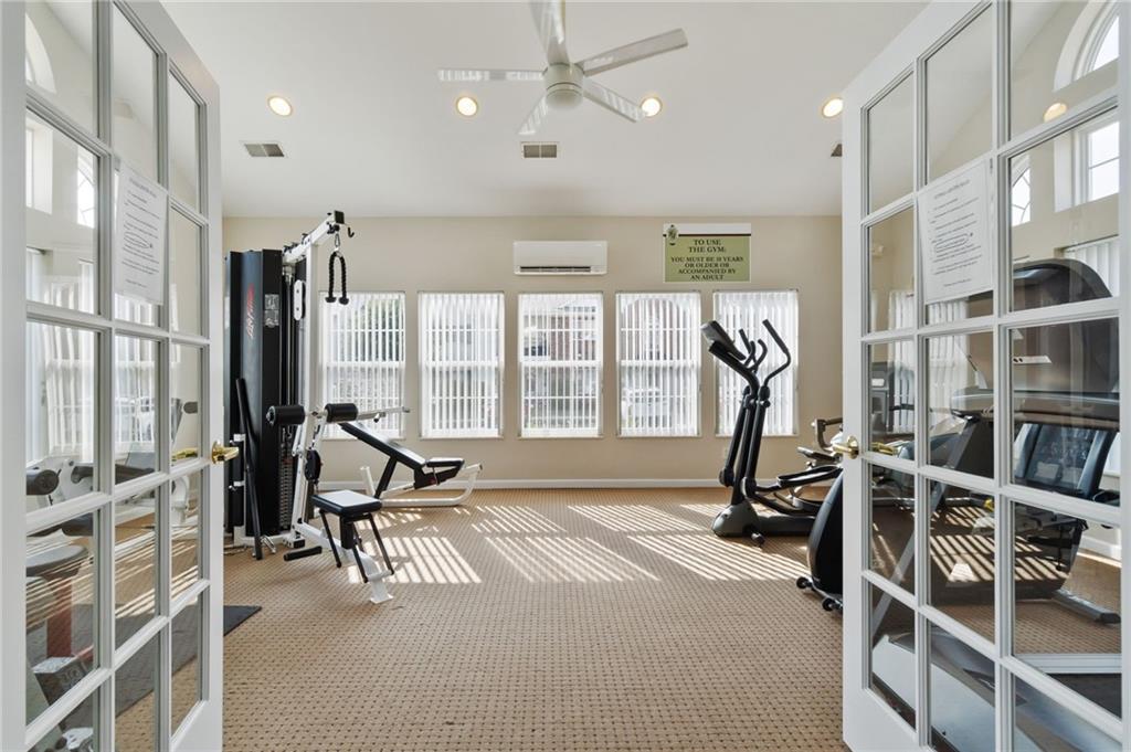 850 Hidden Ridge Court, Unit 101 South Park, PA 15129 - Photo 32 of 38 a view of a room with gym equipment