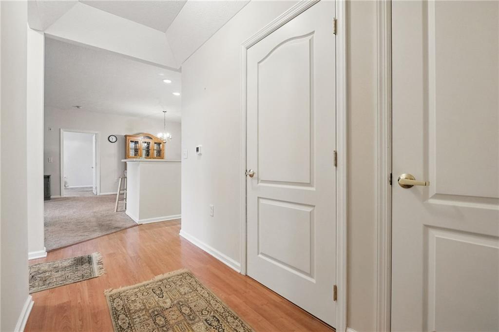 850 Hidden Ridge Court, Unit 101 South Park, PA 15129 - Photo 6 of 38 a view of a hallway with wooden floor
