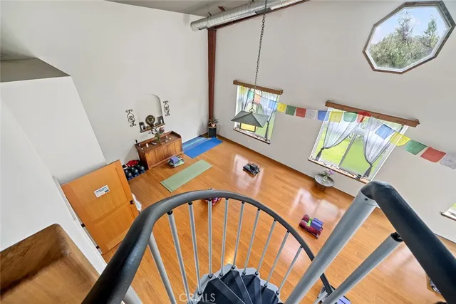 a swimming pool with outdoor seating and yard