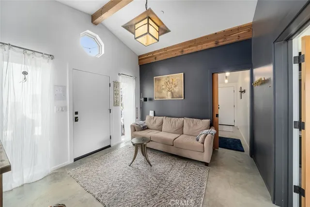 a view of a park with swings and slides