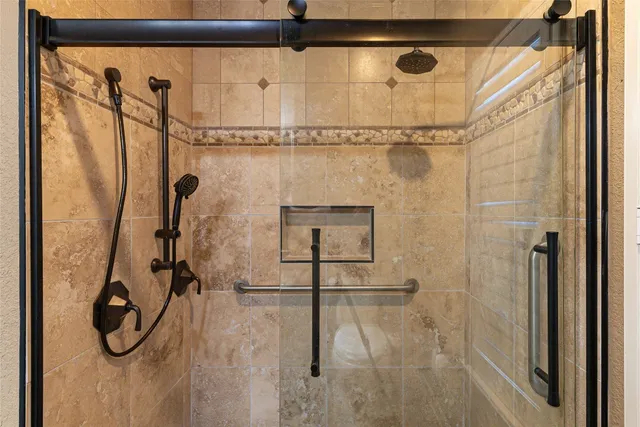 a view of a swimming pool with a patio