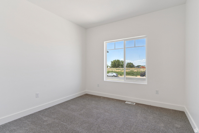 5777 West 4100 South Hooper, UT 84315 - Photo 19 of 41 Carpeted empty room featuring baseboards
