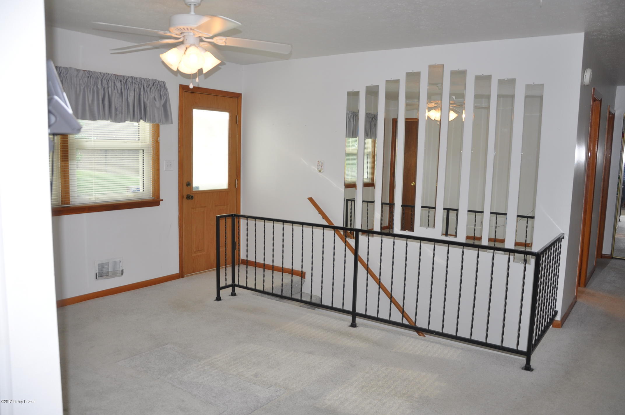 6316 Terry Road Louisville, KY 40258 - Photo 9 of 37 Notice the open stairwell that leads to the finished basement