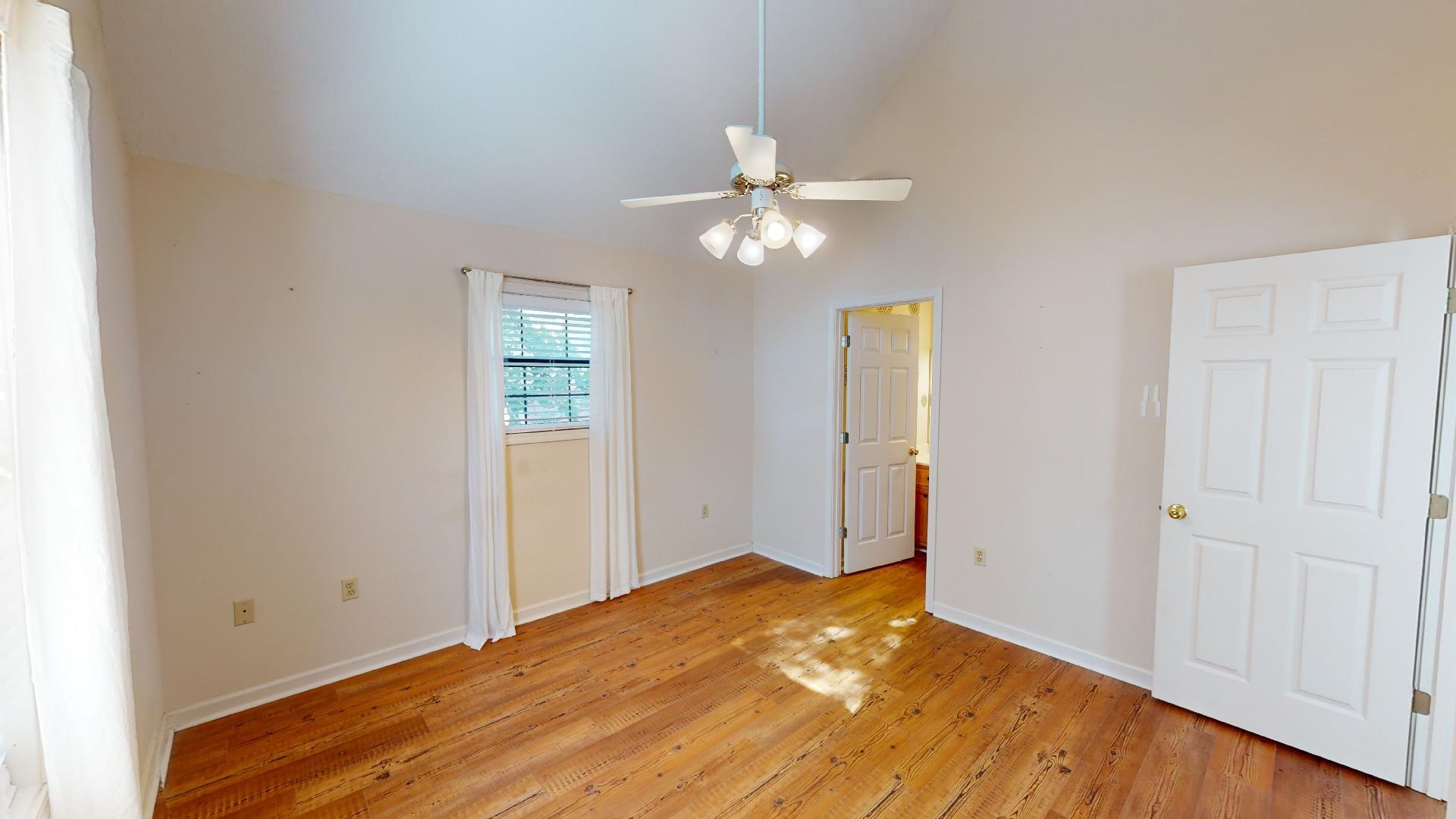 54 Whispering Lane Counce, TN 38326 - Photo 16 of 35 a view of empty room with wooden floor