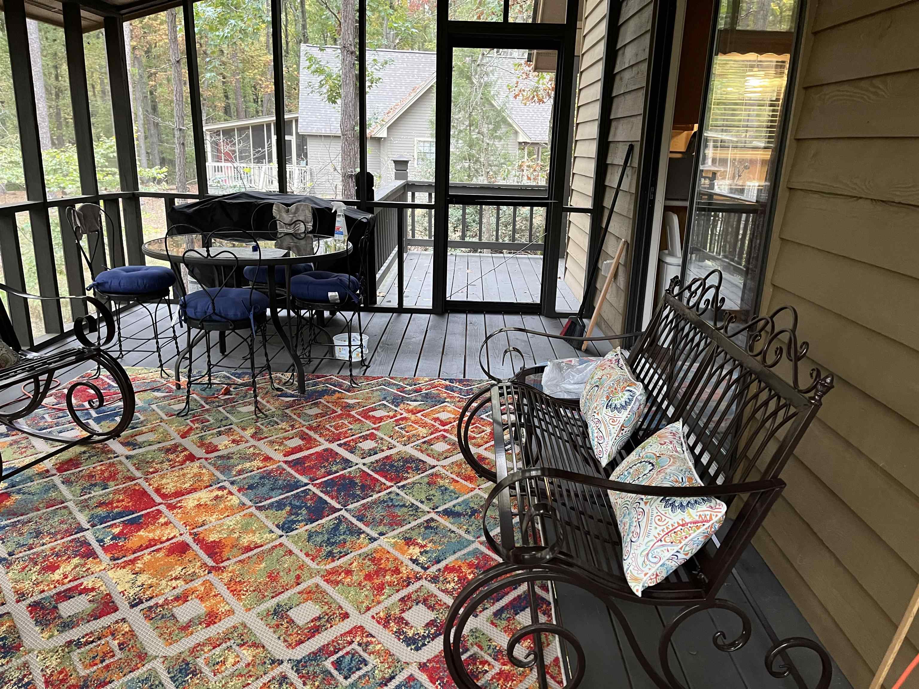 54 Whispering Lane Counce, TN 38326 - Photo 29 of 35 a outdoor living area with furniture and a floor to ceiling window