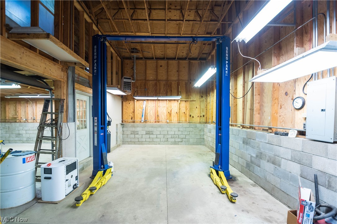 6944 Sidley Road Thompson, OH 44086 - Photo 27 of 34 car lift comes with the property