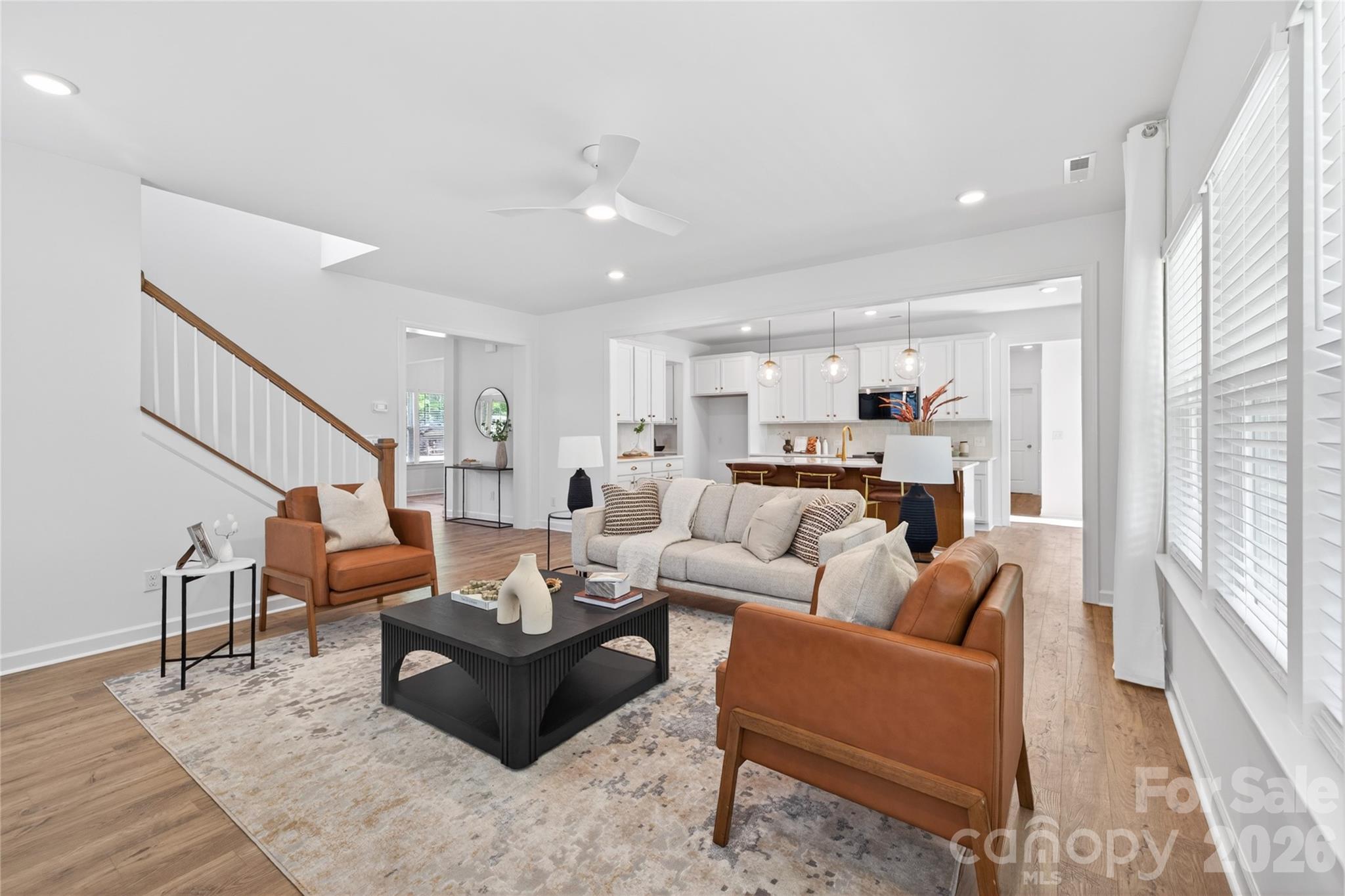 128 Overcash Road, Unit 7171 Troutman, NC 28166 - Photo 13 of 41 a living room with furniture and a large window