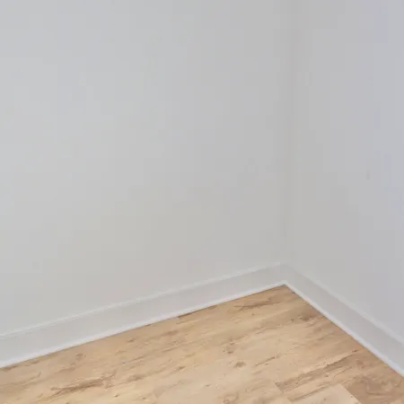 a view of a room with an empty space
