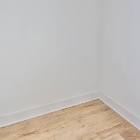 a view of a room with an empty space