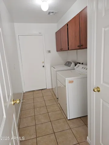 an empty room with mirror