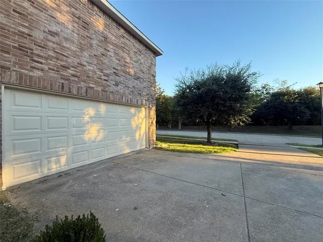 a view of a swimming pool with an outdoor space and seating area
