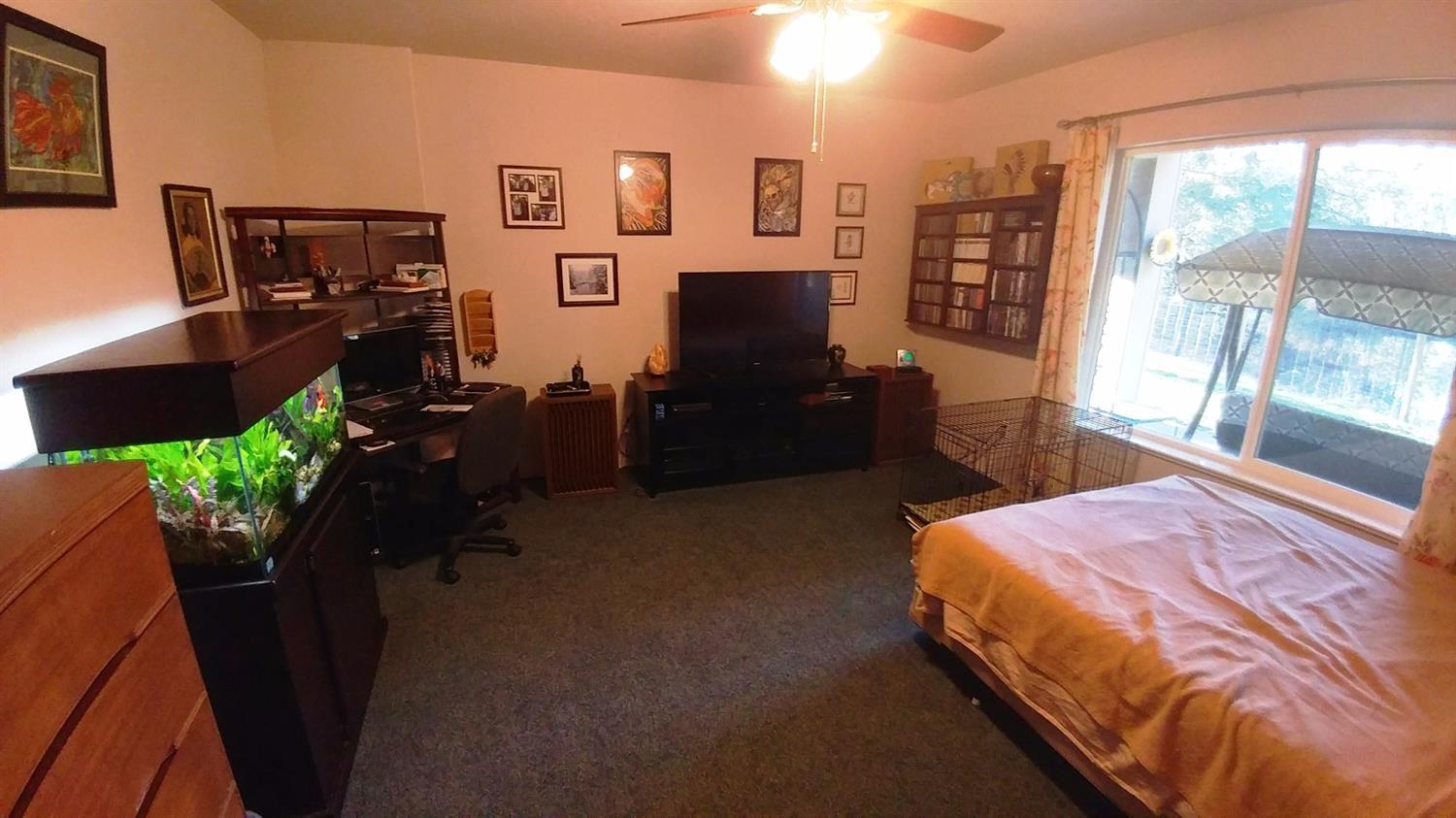 1390 Crow Road Merlin, OR 97532 - Photo 25 of 35 a bedroom with furniture and a flat screen tv