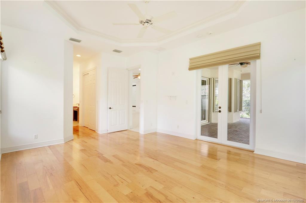 736 Southwest Pebble Lane Palm City, FL 34990 - Photo 22 of 54 wooden floor in an empty room